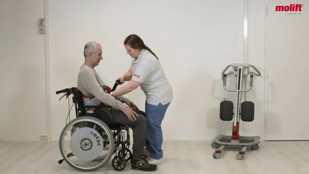 Transfer from a wheelchair using a 2-point lifting arm with StandUp sling
