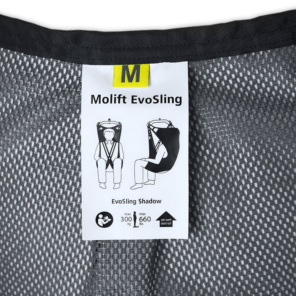 The label is a traditional label that can be folded away if needed to achieve a comfortable position for the head in the moulded seat / in the wheelchair.